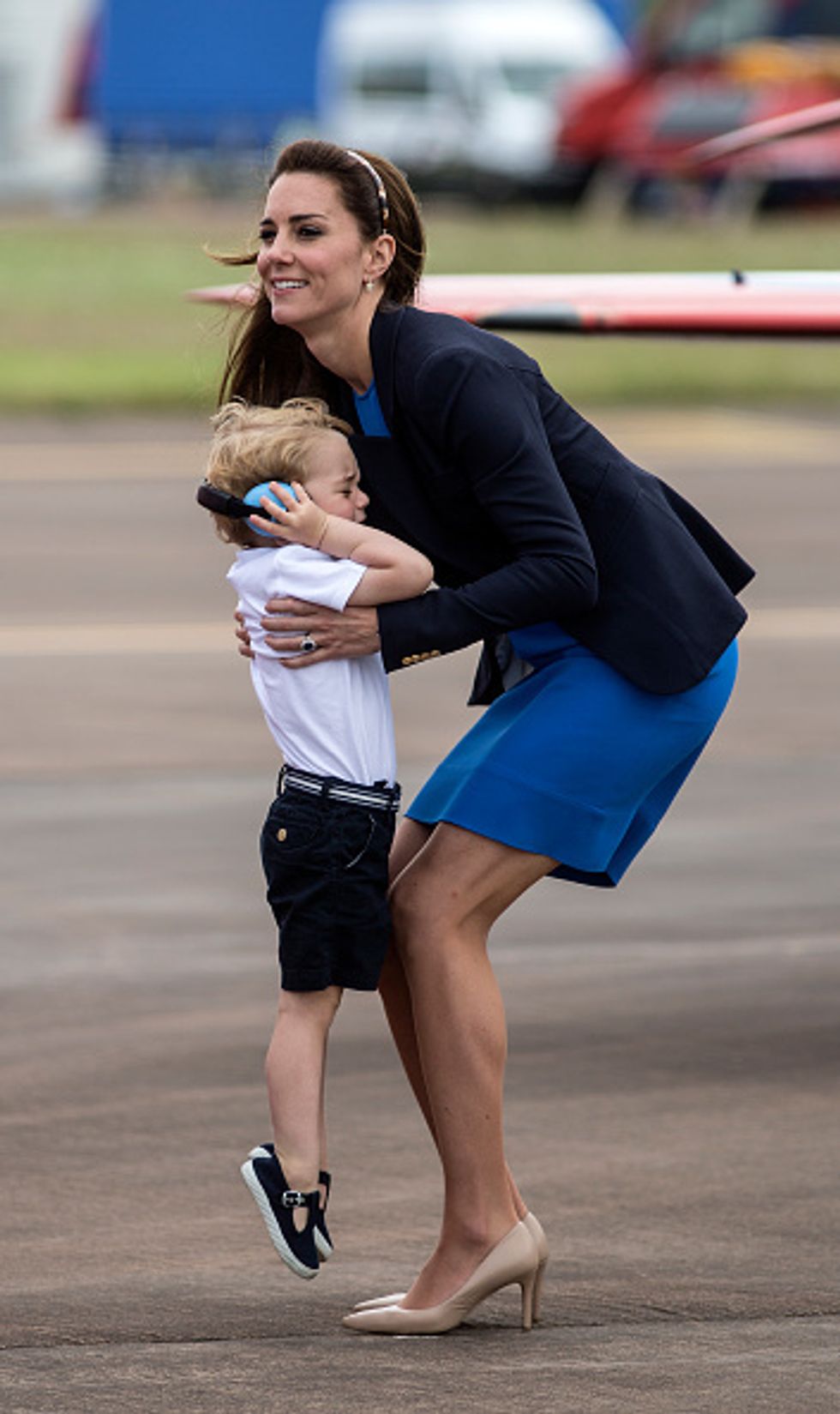 5 photos that prove kate middleton is a mom first royal second 4 Motherly