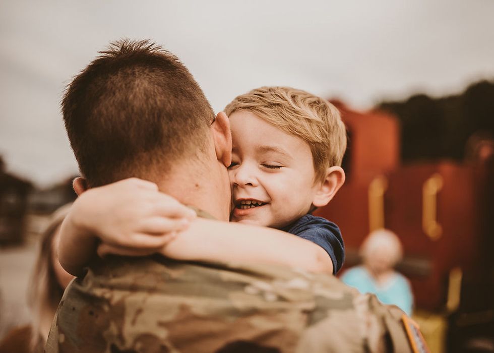 military dad and babys first meeting viral photos 1 Motherly