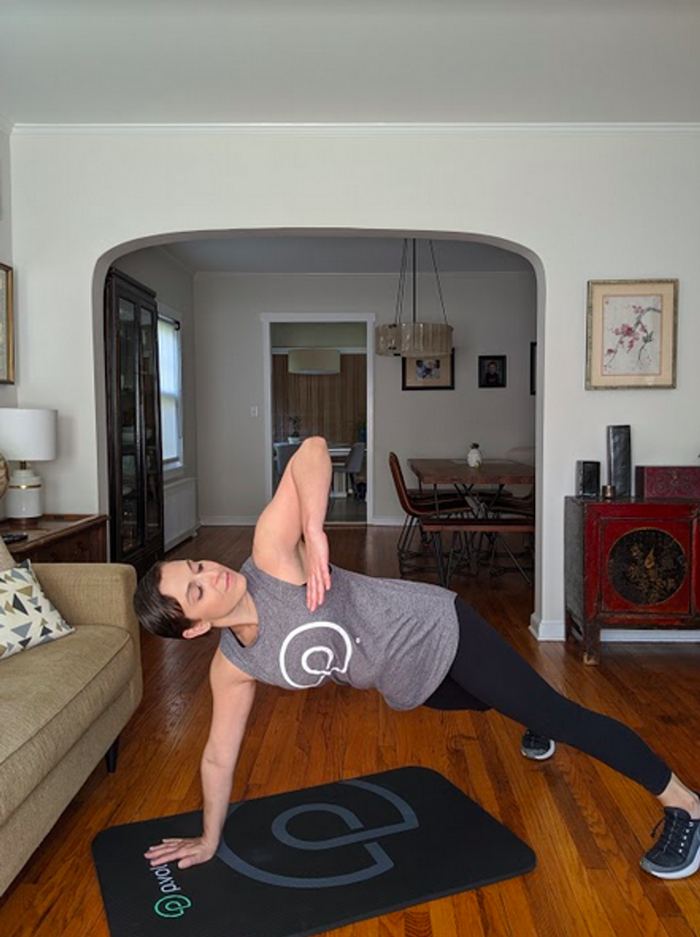 Plank with elbow lift