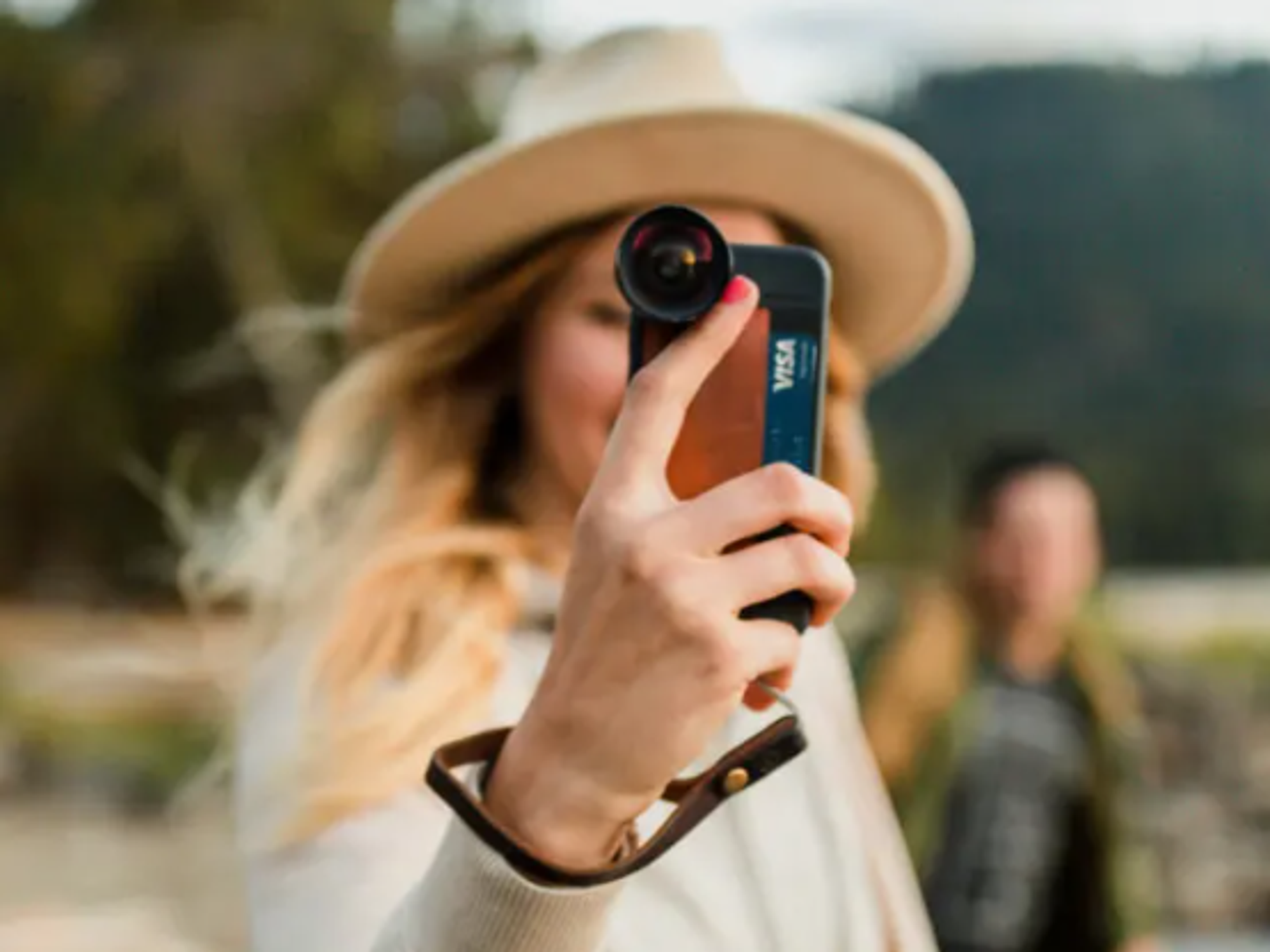 Girl-holding-camera