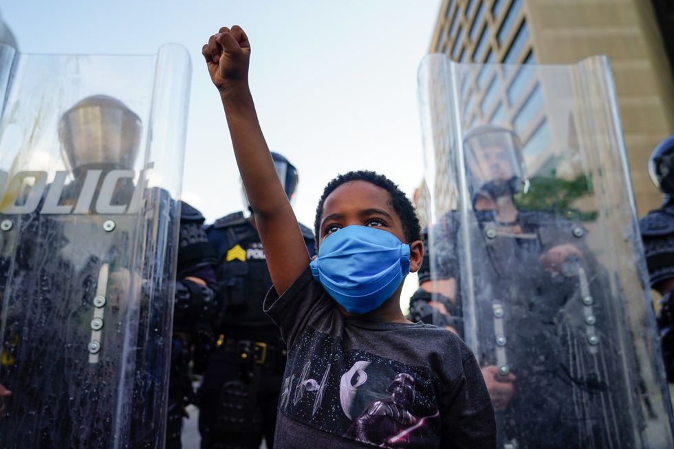 powerful photos children protests 13 Motherly