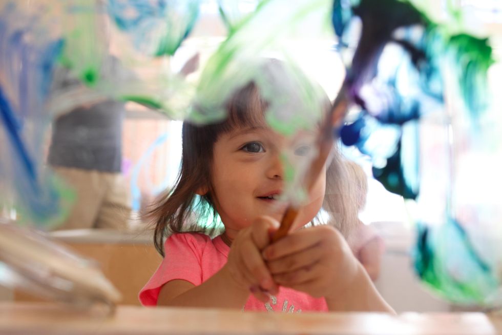 toddler painting window