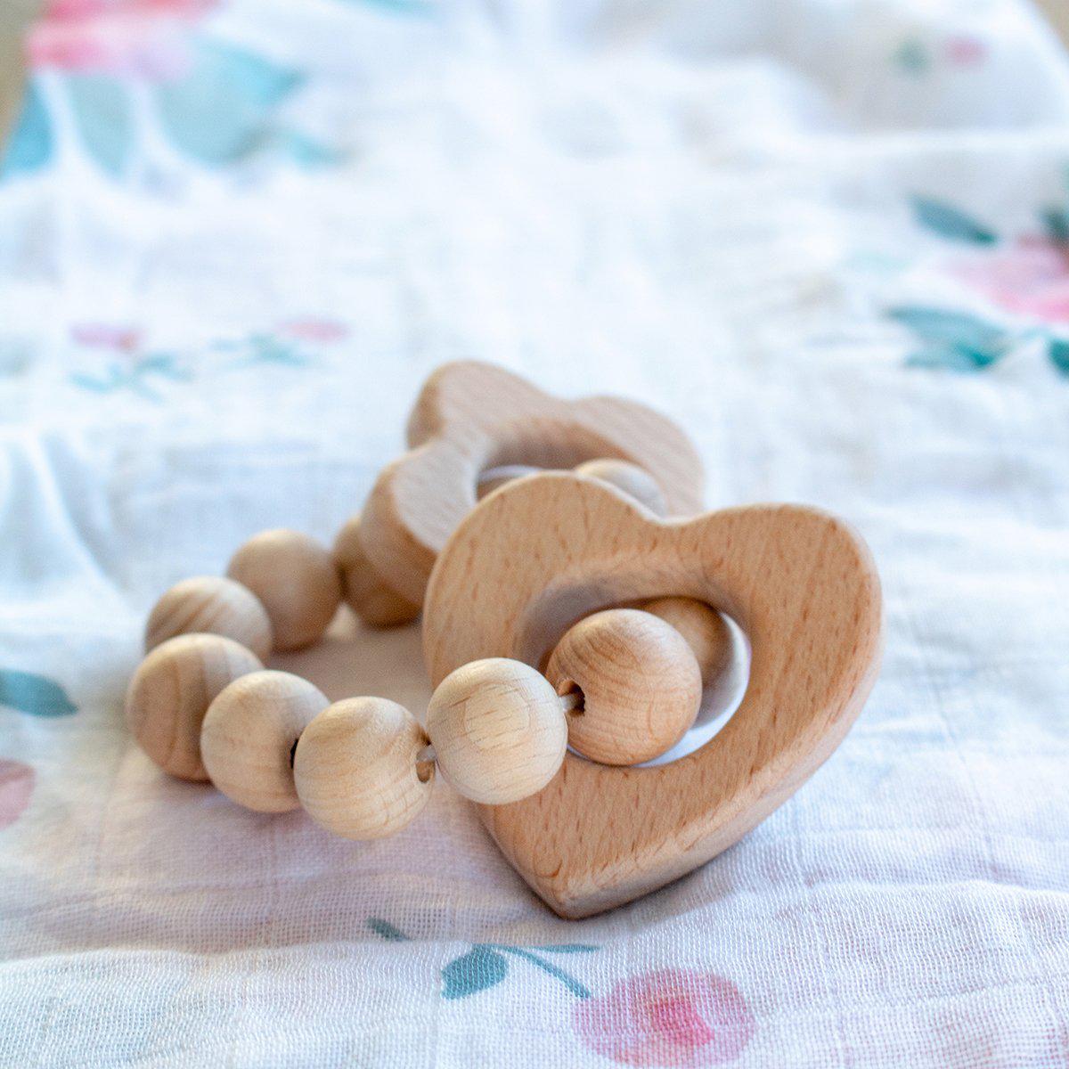 Bebe au lait heart and flower wooden teether